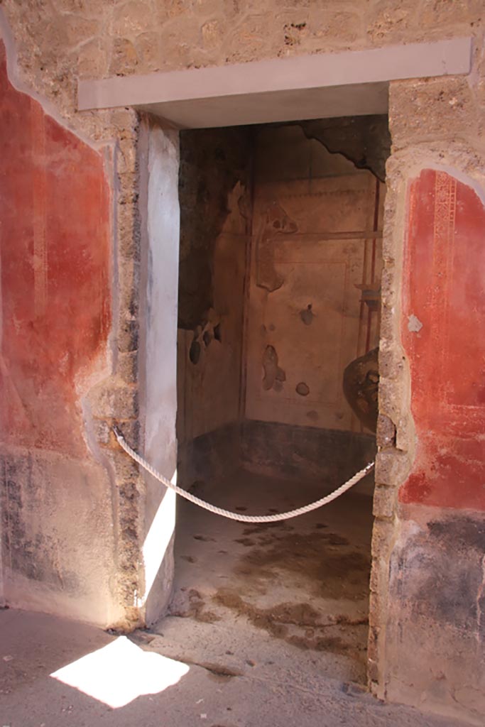 I.10.11 Pompeii. October 2022. 
Room 2, looking towards doorway to room 7, in south-east corner of atrium. Photo courtesy of Klaus Heese. 

