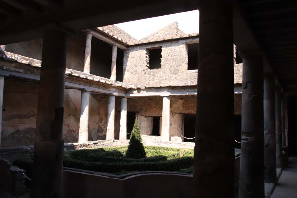 I.10.11 Pompeii. September 2021. Room 10, peristyle, looking north-east from south-west portico. Photo courtesy of Klaus Heese.
