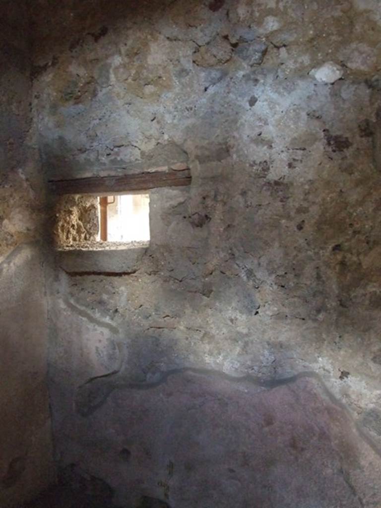 I.10.11 Pompeii. March 2009. Room 17, north wall with small window to peristyle.
