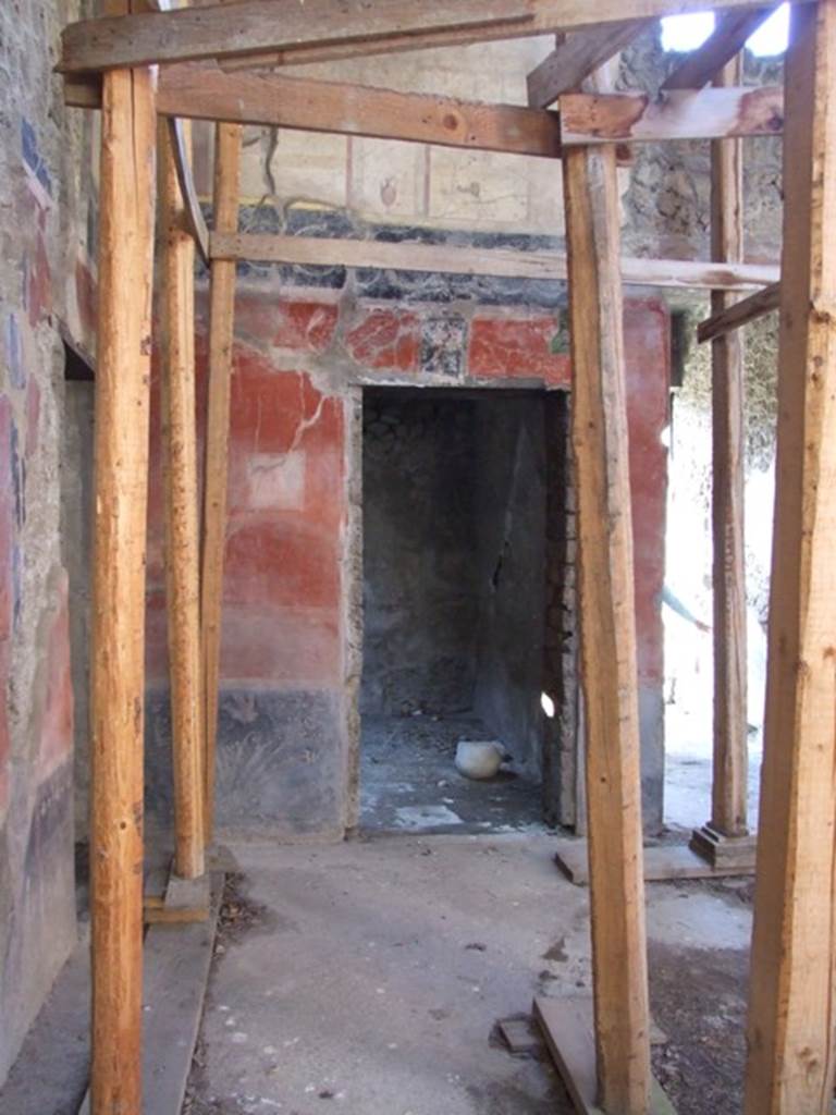 I.10.11 Pompeii. March 2009. 
Room 2, south-west corner of atrium, looking towards doorway to room 3, on south side of entrance corridor.  
