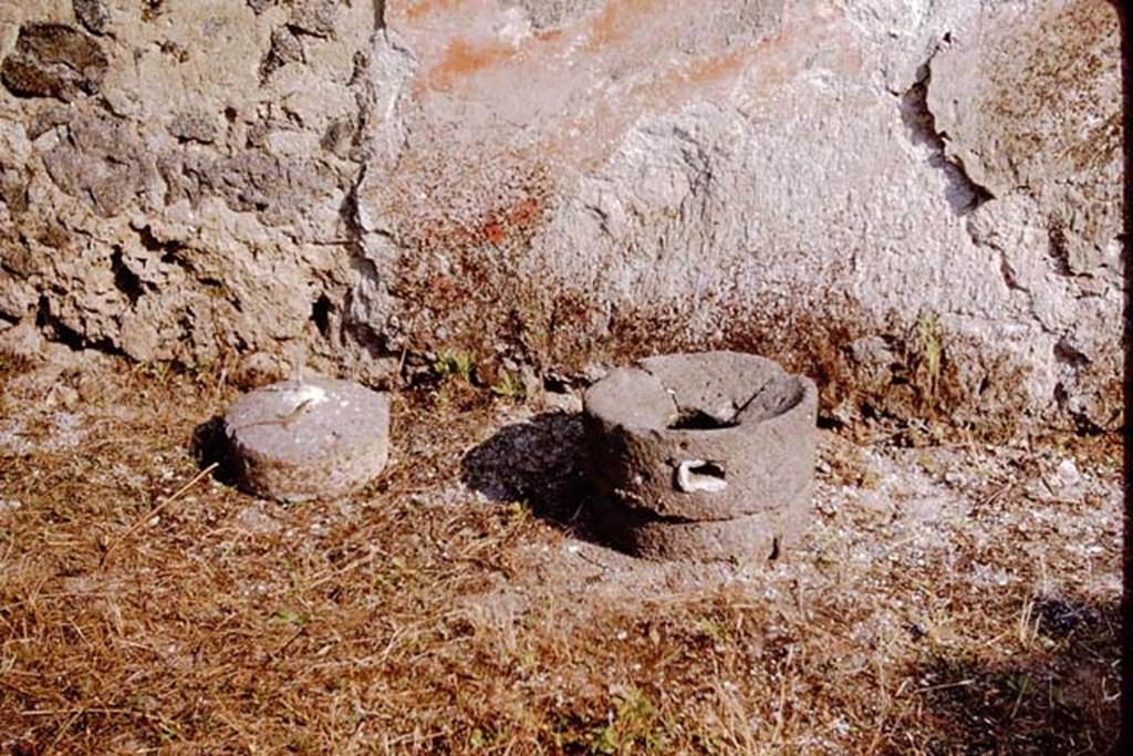 I.11.10 Pompeii. 1964. Mill stones against south wall of garden area. Photo by Stanley A. Jashemski.
Source: The Wilhelmina and Stanley A. Jashemski archive in the University of Maryland Library, Special Collections (See collection page) and made available under the Creative Commons Attribution-Non Commercial License v.4. See Licence and use details.
J64f1961
