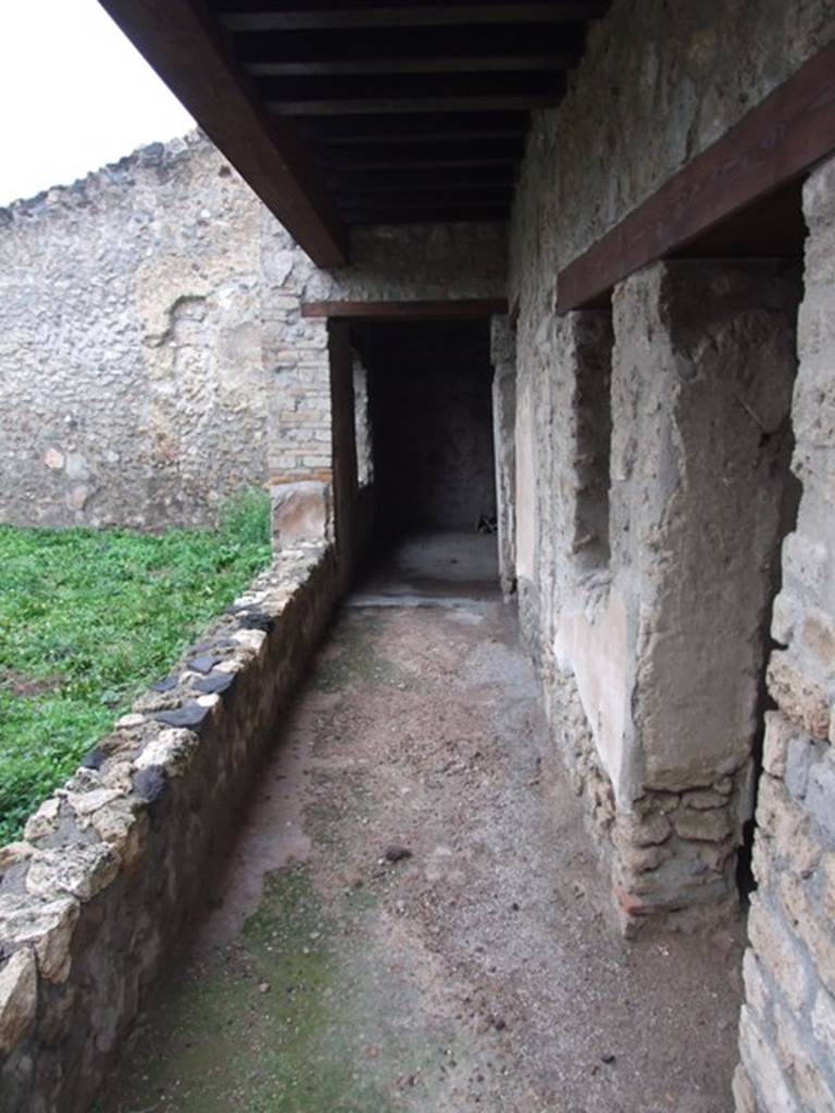 I.11.15 Pompeii. December 2007. Room 10, garden area, looking north towards doorways of rooms 19 and 20 on lower level.
