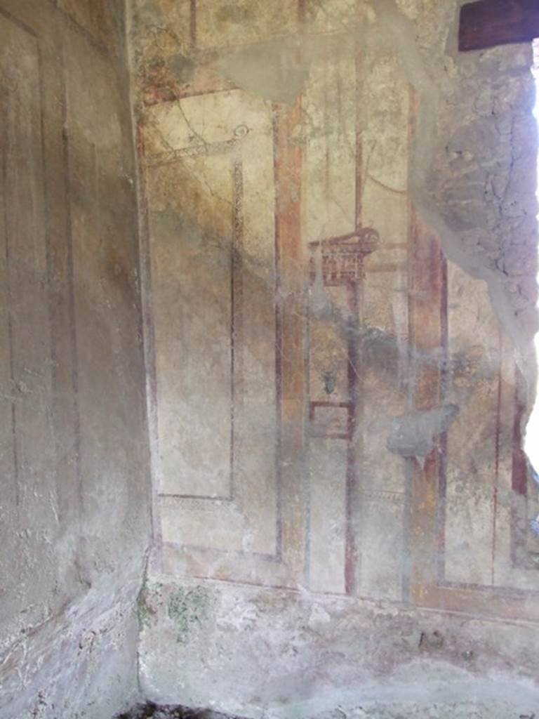 I.12.2 and I.12.1 Pompeii.  March 2009. Room 7.  Triclinium.  North wall, west side. Painted decoration.