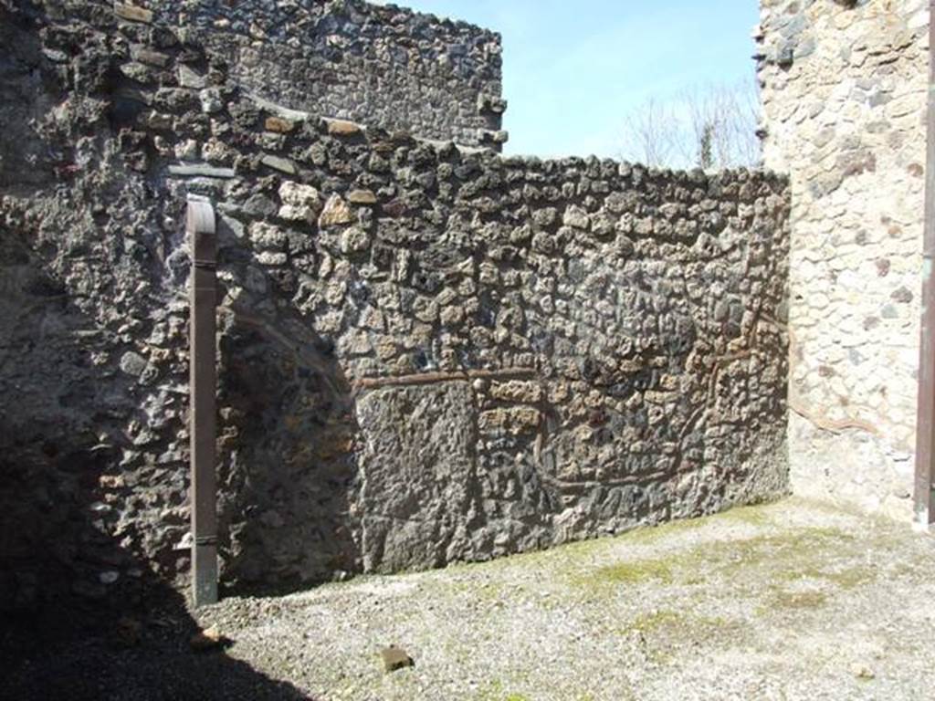 I.12.2 and I.12.1 Pompeii.  March 2009.  Room 17.  West wall.