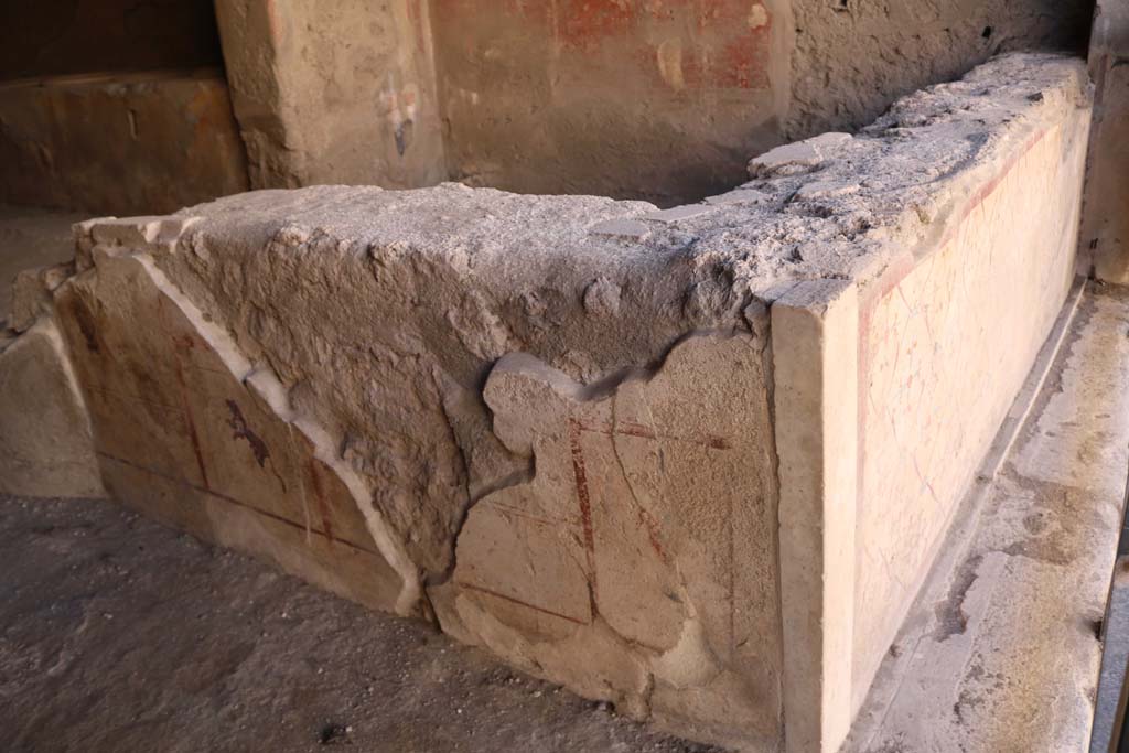 I.12.3 Pompeii. December 2018. Looking towards east side end of counter with painted plaster. Photo courtesy of Aude Durand.