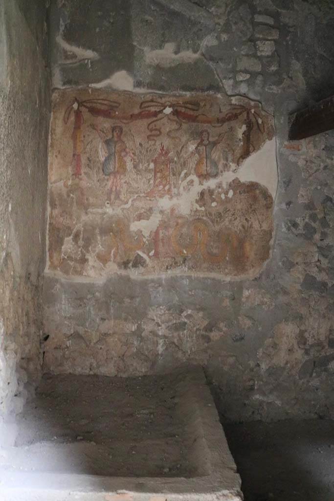 I.12.3 Pompeii. December 2018. 
Room 4, looking towards east wall in kitchen with water basin. Photo courtesy of Aude Durand.
