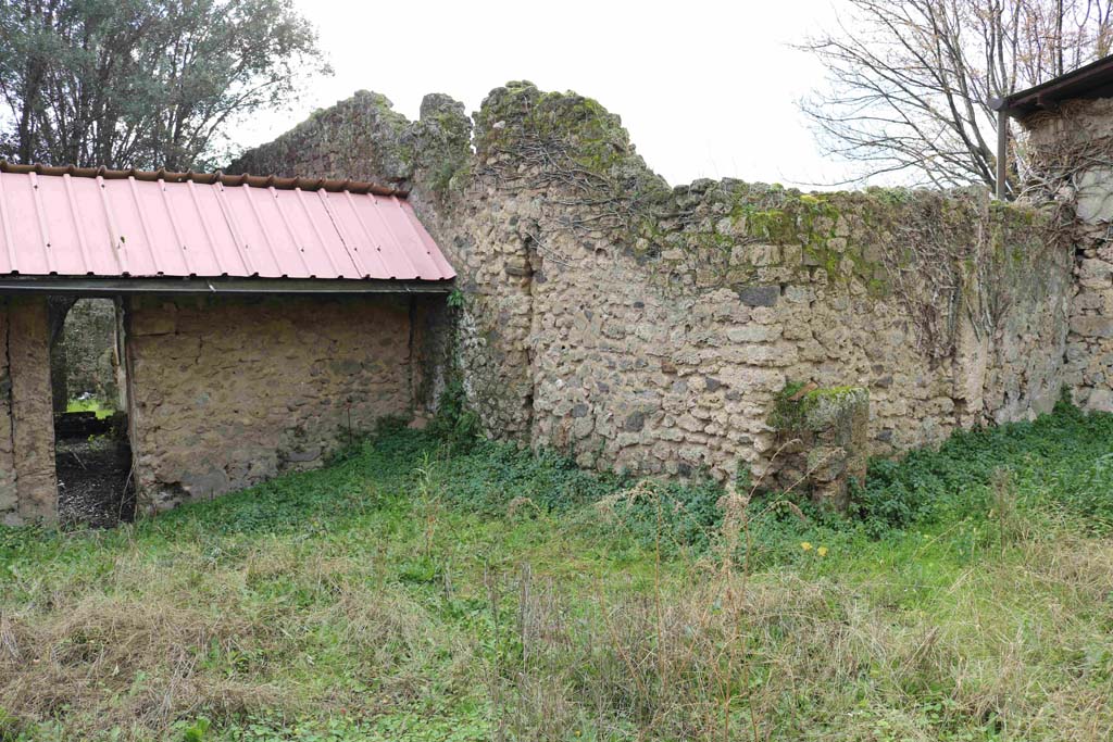 I.12.8 Pompeii. December 2018.
Room 13, looking towards south wall, with doorway to room 9 peristyle garden, and south-west corner, on right. Photo courtesy of Aude Durand.