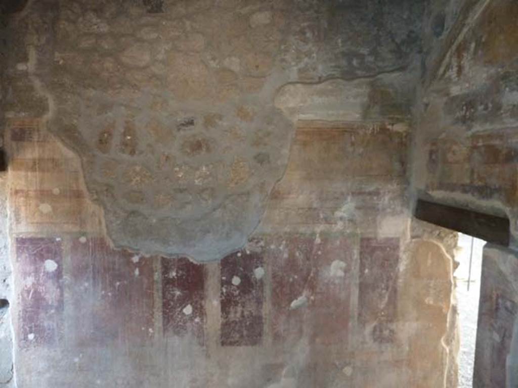 I.13.2 Pompeii, September 2015. West wall of anteroom, with small doorway from atrium, on the right in north-west corner. Taken through window from I.13.3.

