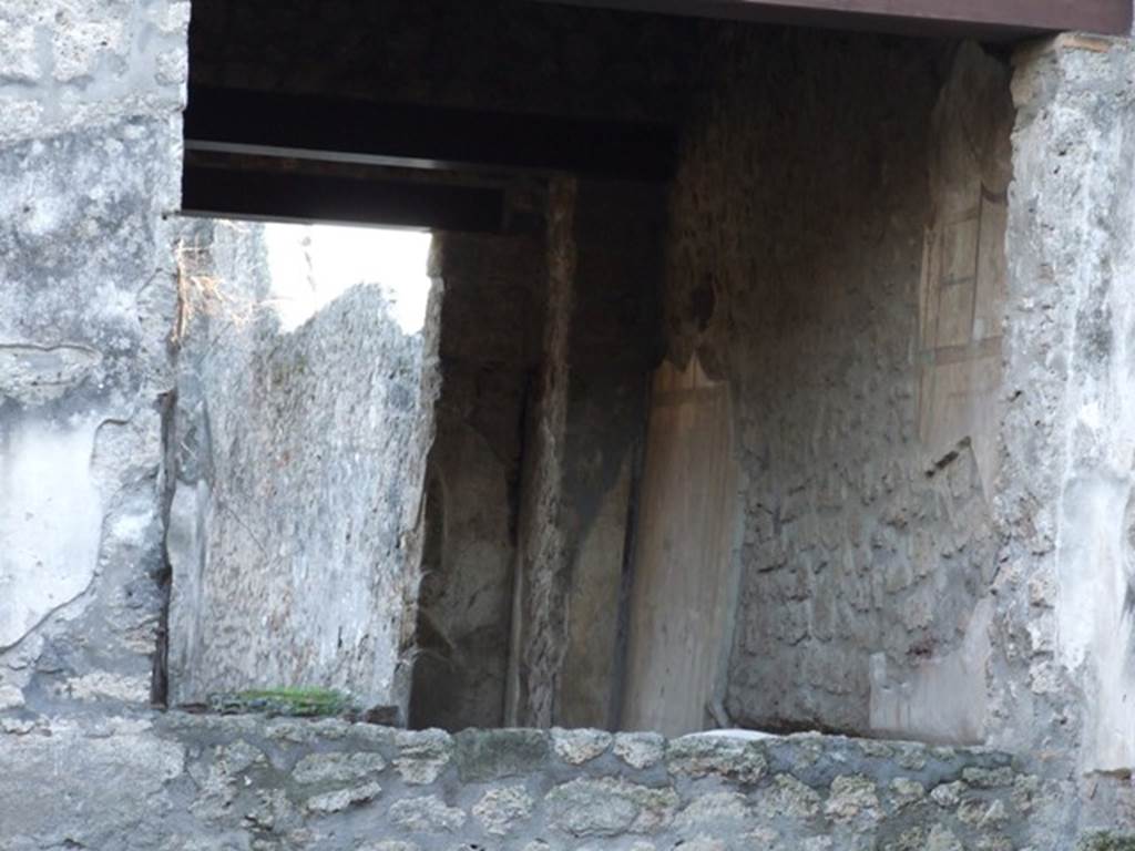 I.13.2 Pompeii. December 2007.  West wall of Triclinium with large window onto atrium and access at rear to garden area with outside Triclinium.