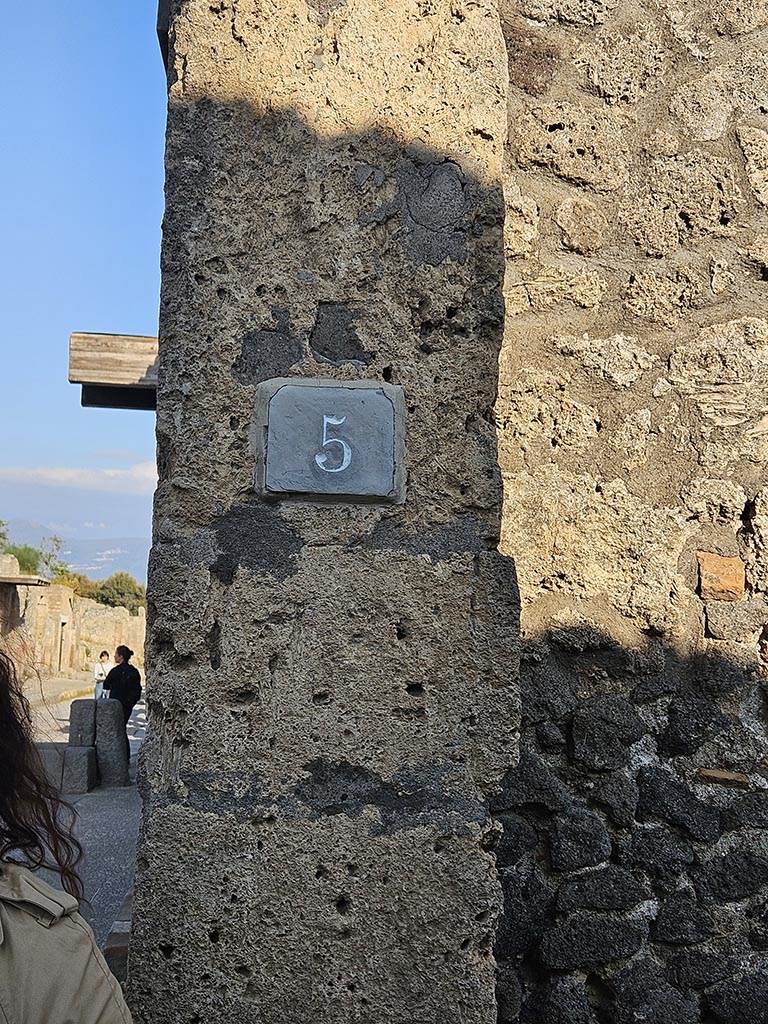 I.13.5 Pompeii. November 2024. 
Identification number-plate on east side of entrance doorway. Photo courtesy of Annette Haug.

