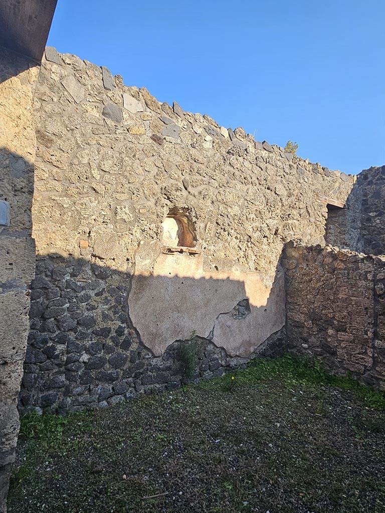 I.13.5 Pompeii. November 2024. 
Looking towards east wall of shop-room with niche. Photo courtesy of Annette Haug.
