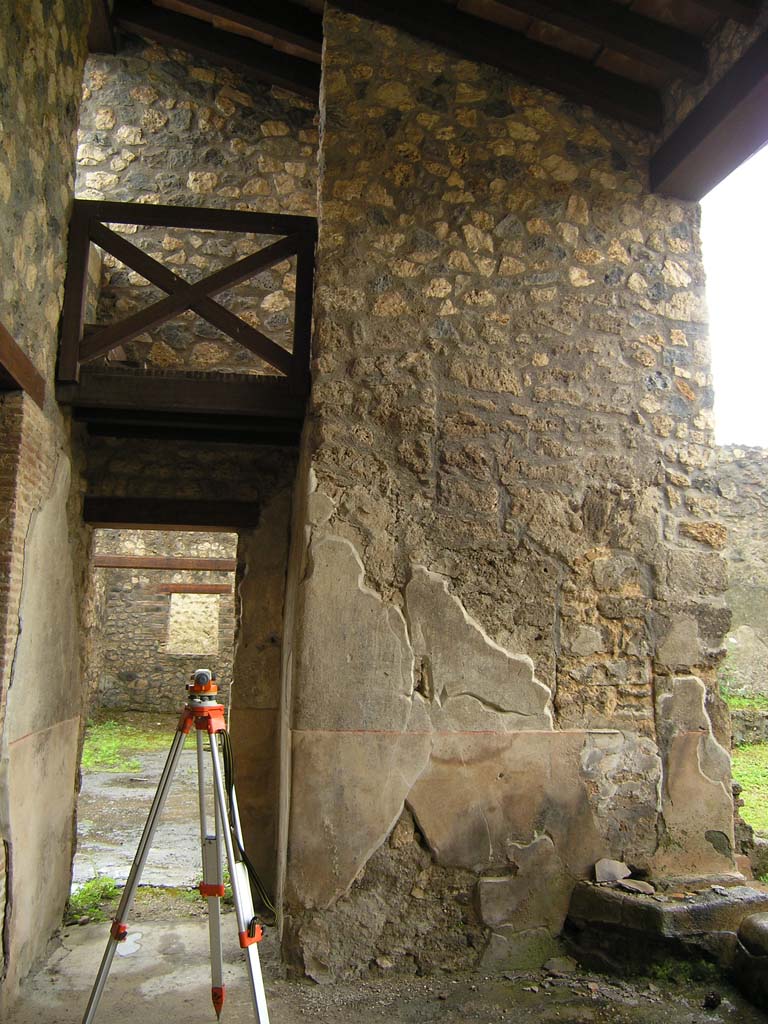 I.14.2 Pompeii. July 2008. Area L, looking south through doorway and across atrium towards room F.
Photo courtesy of Guilhem Chapelin.