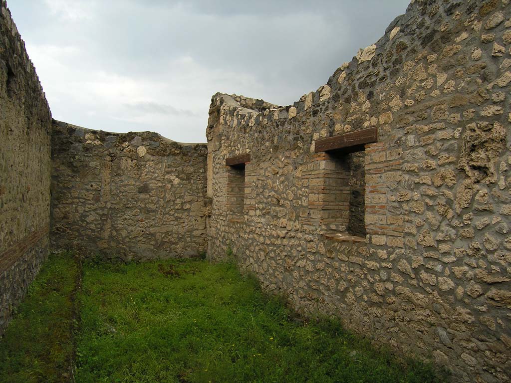 I.14.2 Pompeii. July 2008. Area G, looking towards west wall, and north wall with windows.
Photo courtesy of Guilhem Chapelin. 
