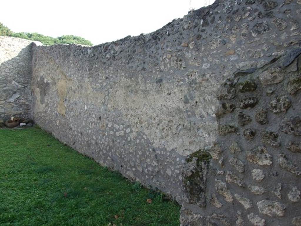 I.14.9 Pompeii. December 2007. South wall with latrine and kitchen wall to right. According to Eschebach, the kitchen and latrine were on the right of entrance numbered 1.14.9. See Eschebach, L., 1993. Gebäudeverzeichnis und Stadtplan der antiken Stadt Pompeji. Köln: Böhlau. (p.73)