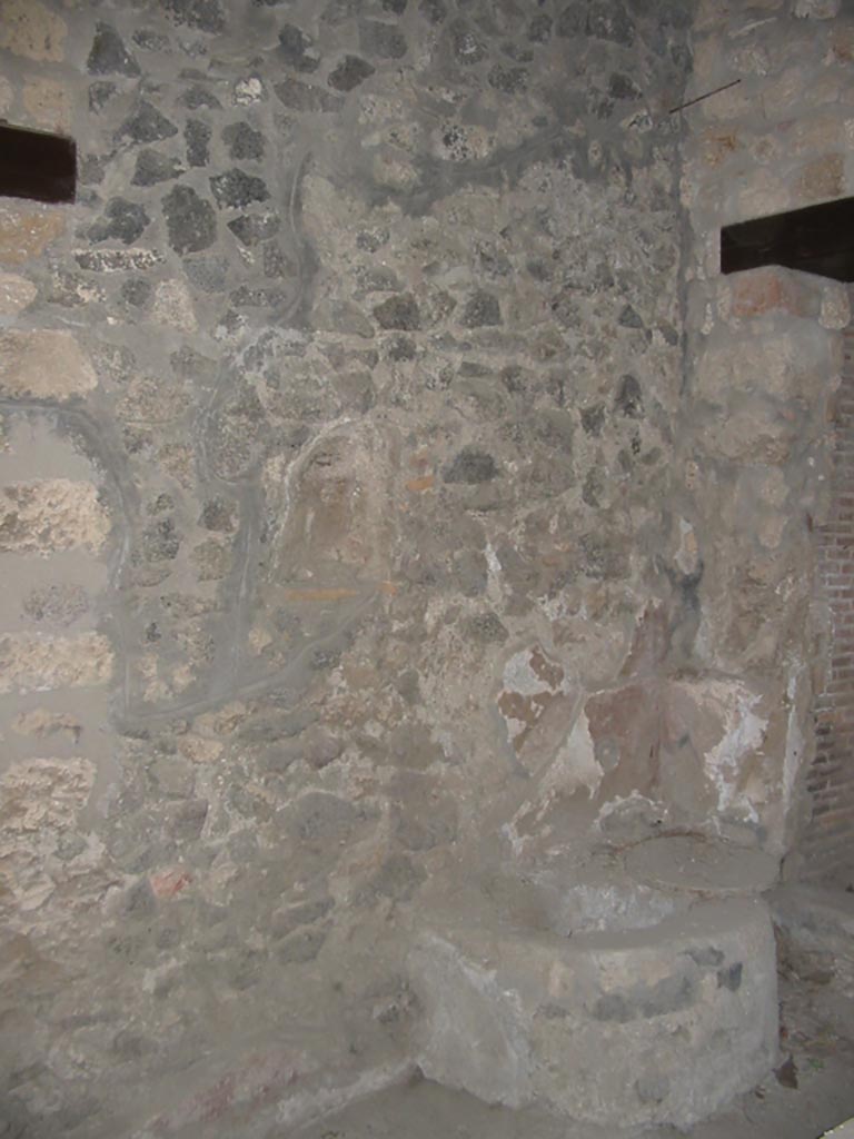 I.14.15 Pompeii. May 2003. 
West wall with feature near door to room on north side. Photo courtesy of Nicolas Monteix.

