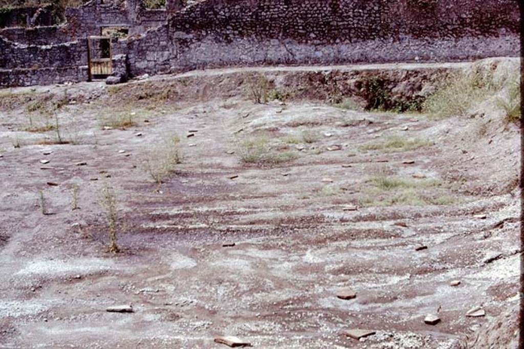 I.15.3 Pompeii, 1973. Looking towards doorway at I.15.4 and west side. Photo by Stanley A. Jashemski. 
Source: The Wilhelmina and Stanley A. Jashemski archive in the University of Maryland Library, Special Collections (See collection page) and made available under the Creative Commons Attribution-Non Commercial License v.4. See Licence and use details. J73f0604
