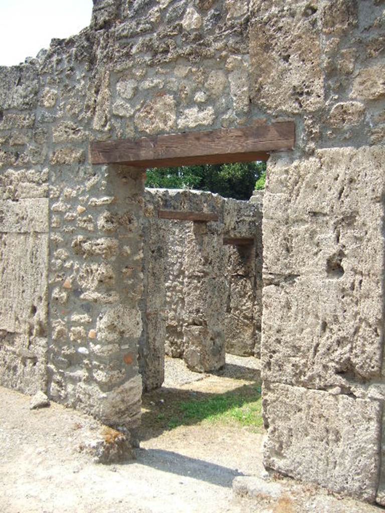 I.16.7 Pompeii. May 2006. Entrance doorway, looking south-west.