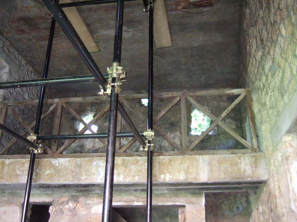 I.17.4 Pompeii. May 2006. Open area or yard on south side of peristyle garden. Reconstructed wooden upper gallery.