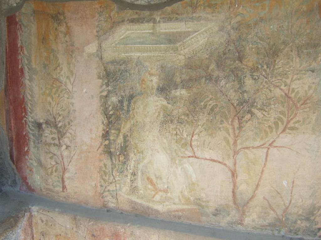 I.17.4 Pompeii. May 2006. Garden painting at west end of  north wall of peristyle garden.  A centaur supports a square fountain. See Jashemski, W. F., 1993. The Gardens of Pompeii, Volume II: Appendices. New York: Caratzas. (p.328).
