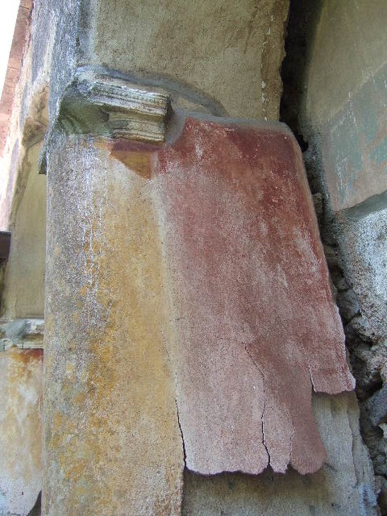 I.17.4 Pompeii.  May 2006.  East wall of peristyle garden.