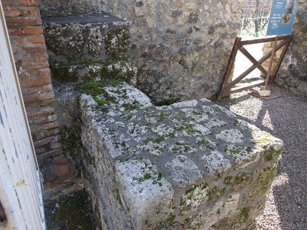 I.20.2 Pompeii. December 2006. Looking south to counter, and doorway to I.20.1 in south wall.