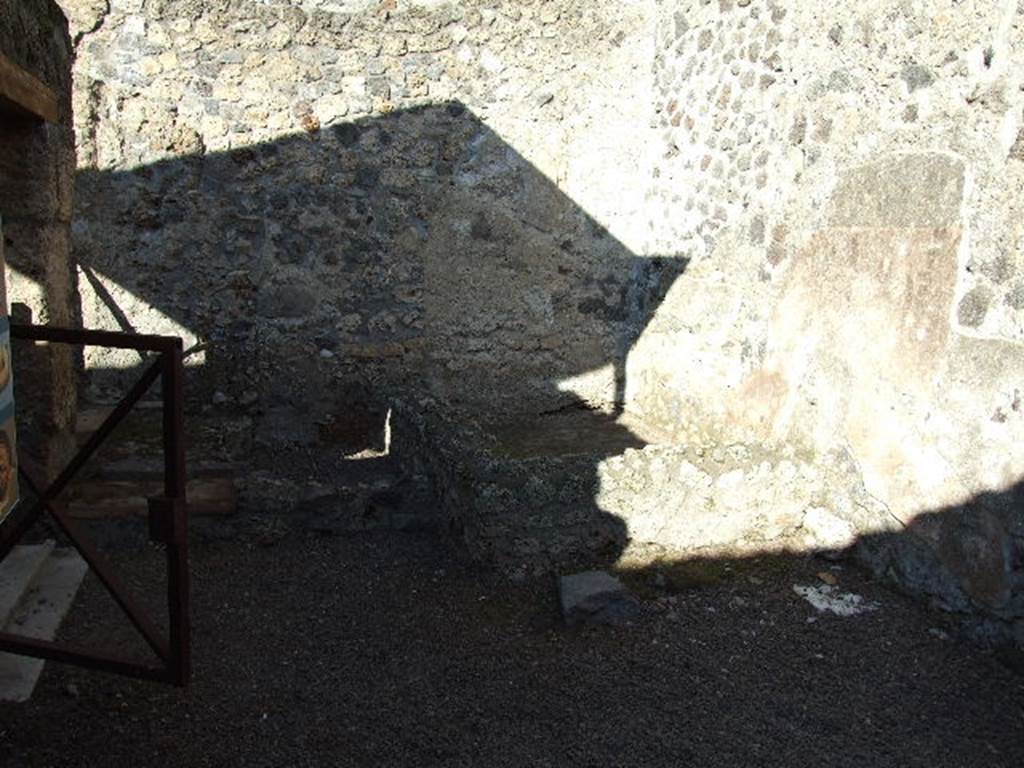 I.20.2 December 2006. Water-tank on north side of entrance room and site of staircase. Looking north.
