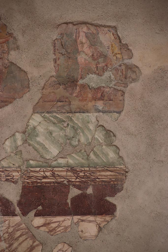II.2 2 Pompeii. October 2023. 
Room “h”, north wall of triclinium lower frieze, detail of Automedon (Achilles' charioteer) readying Achilles' chariot. 
Photo courtesy of Klaus Heese.
