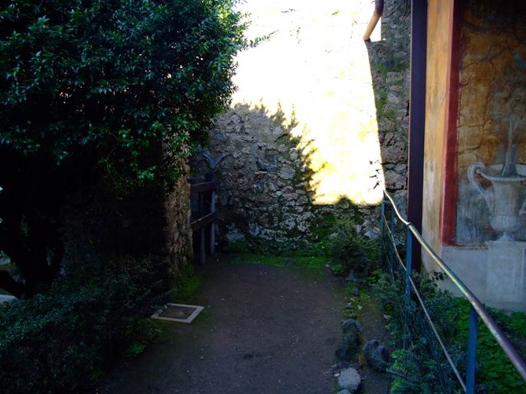 II.3.3 Pompeii.  March 2009. Room 11, South side of Garden area. Looking east towards Rooms 18 and 17.