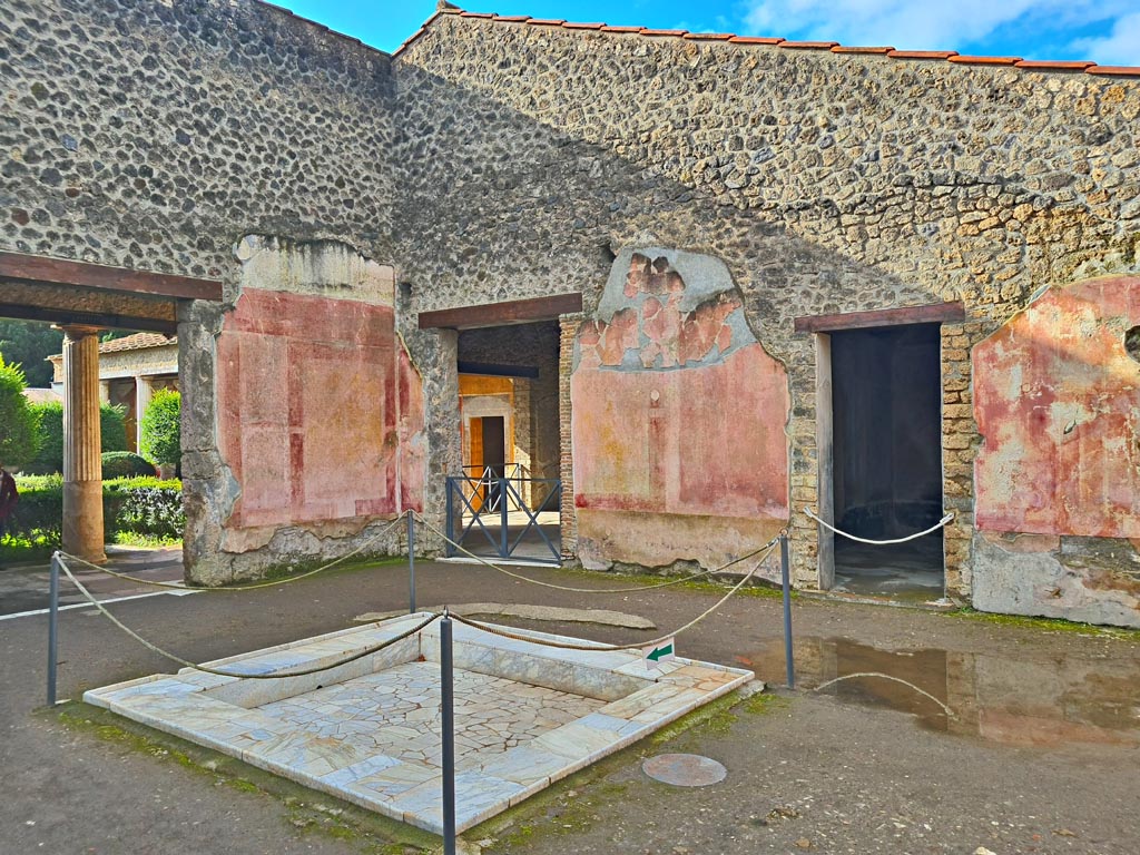 II.3.3 Pompeii. March 2024.
Room 2, looking towards south-west corner of atrium, with doorway into room 11, on left, and rooms 5 and 6, on right.
Photo courtesy of Giuseppe Ciaramella.