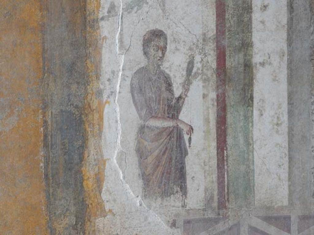 II.3.3 Pompeii. May 2016. Room 9, detail of figure from west end of north wall. Photo courtesy of Buzz Ferebee.