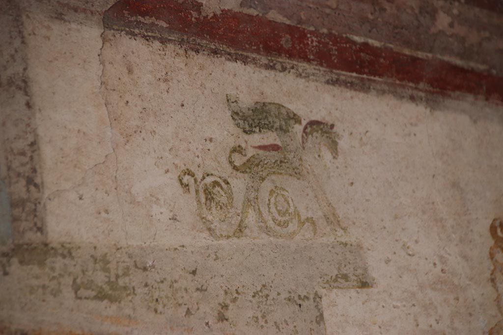 II.3.3 Pompeii. October 2022. Room 10, detail from north end of centre of upper east wall. Photo courtesy of Klaus Heese