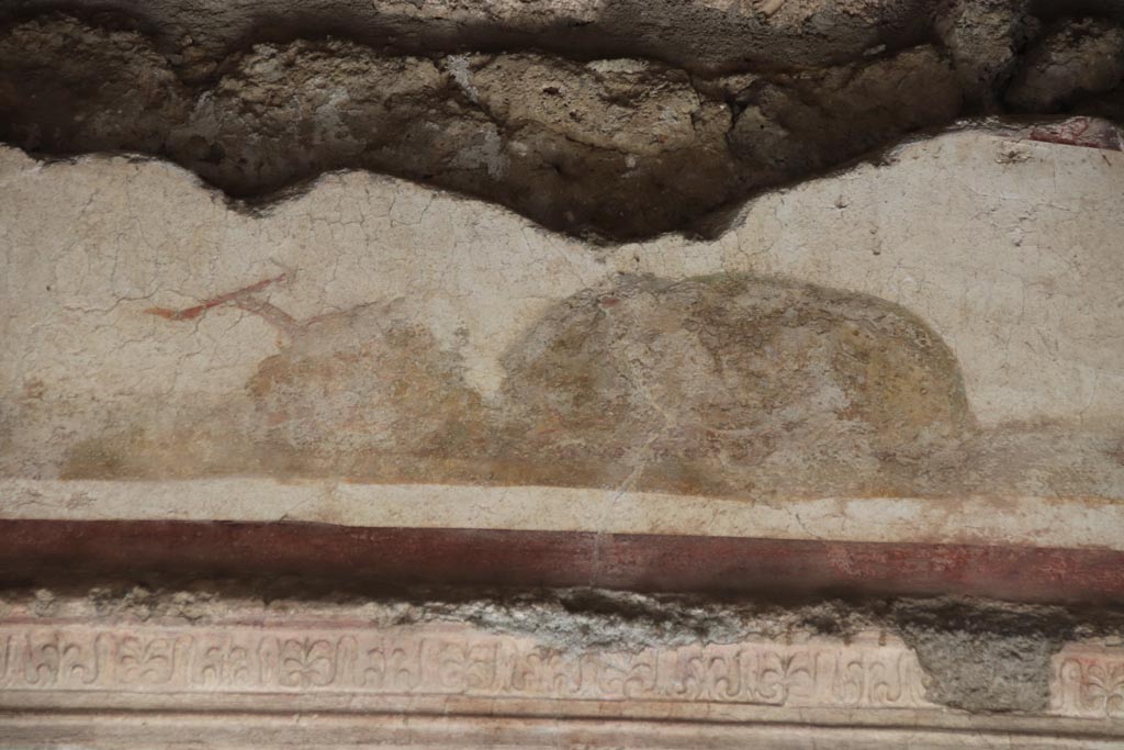 II.3.3 Pompeii. October 2023. Room 10, detail from centre of upper vaulted area of south wall. Photo courtesy of Klaus Heese.