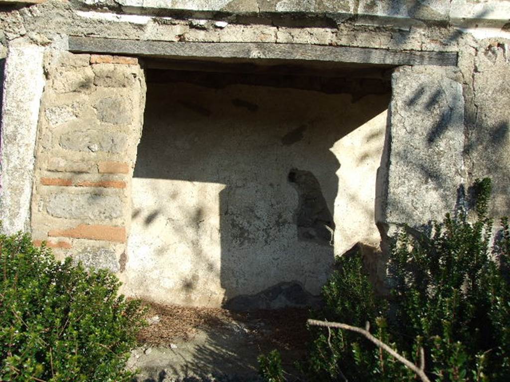 II.8.6 House of the Garden of Hercules.    Lararium.