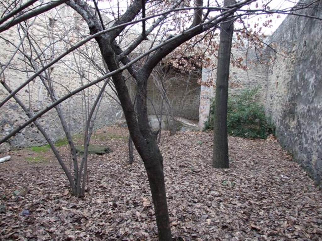 II.9.2 Pompeii. December 2007. Looking east across garden 8 to enclosed triclinium.