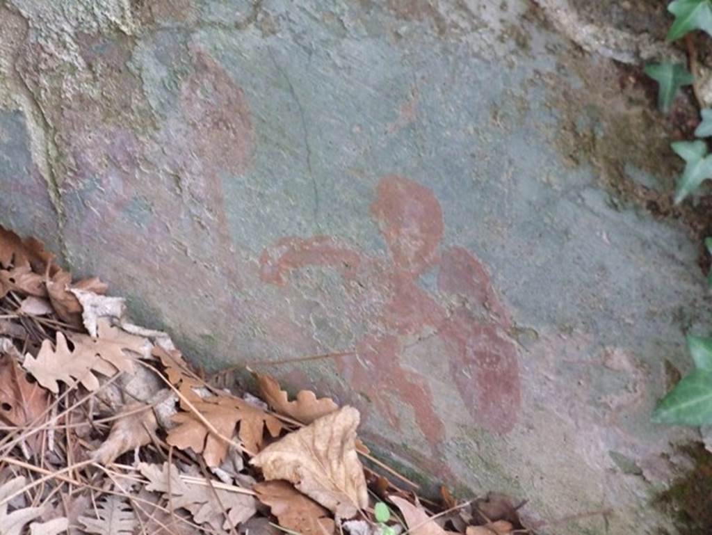 II.9.2. House of the Gemmarius.  December 2007.  Garden.  Painted figure with shield on side of Triclinium.