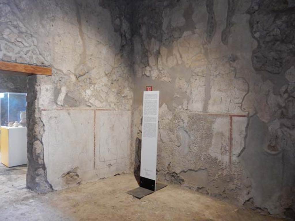 II.9.3, Pompeii. May 2018. Room 11, south-east corner of atrium with doorway to room 14.
Photo courtesy of Buzz Ferebee. 

