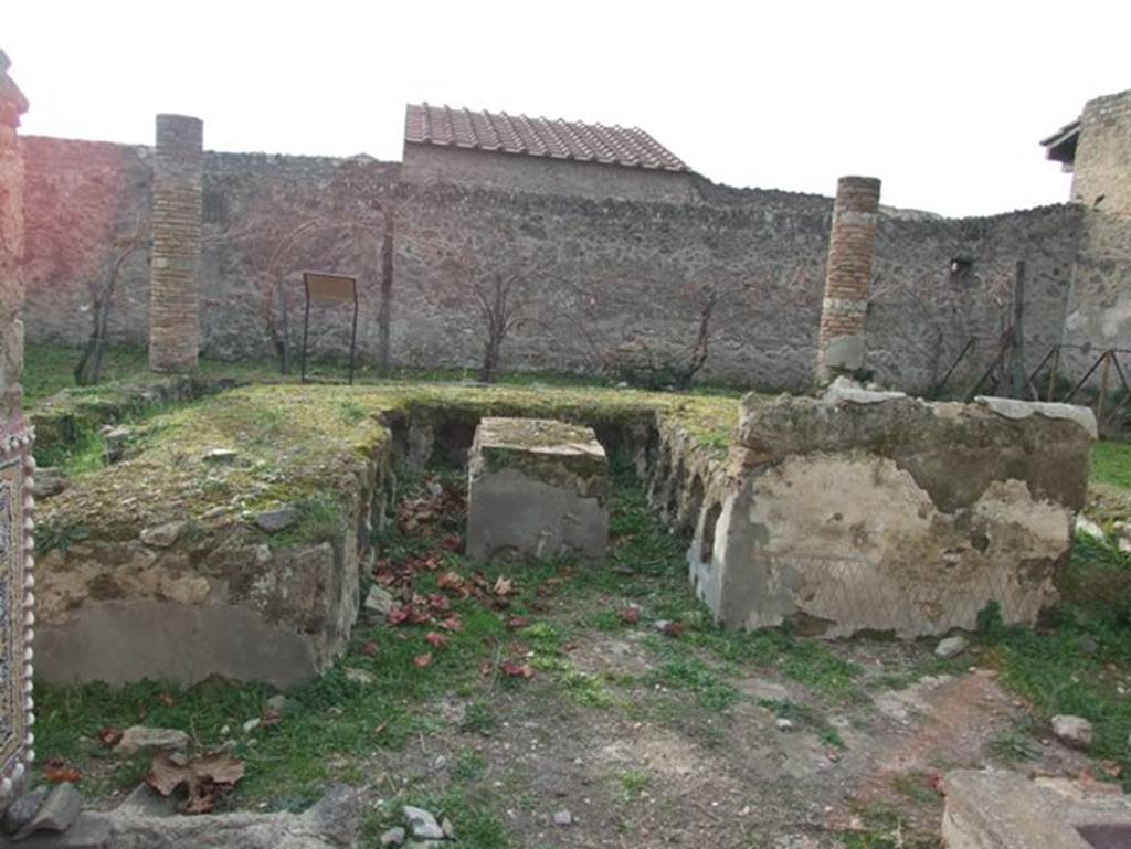 II.9.7. Garden entrance to House of Summer Triclinium.  December 2007.  Grandiose triclinium with painted podium.