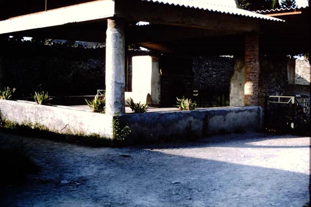 II.9.7 Pompeii. 1964. Triclinium, looking north-east towards north fountain, and the rear of the south fountain.   Photo by Stanley A. Jashemski.
Source: The Wilhelmina and Stanley A. Jashemski archive in the University of Maryland Library, Special Collections (See collection page) and made available under the Creative Commons Attribution-Non Commercial License v.4. See Licence and use details. J64f1650
