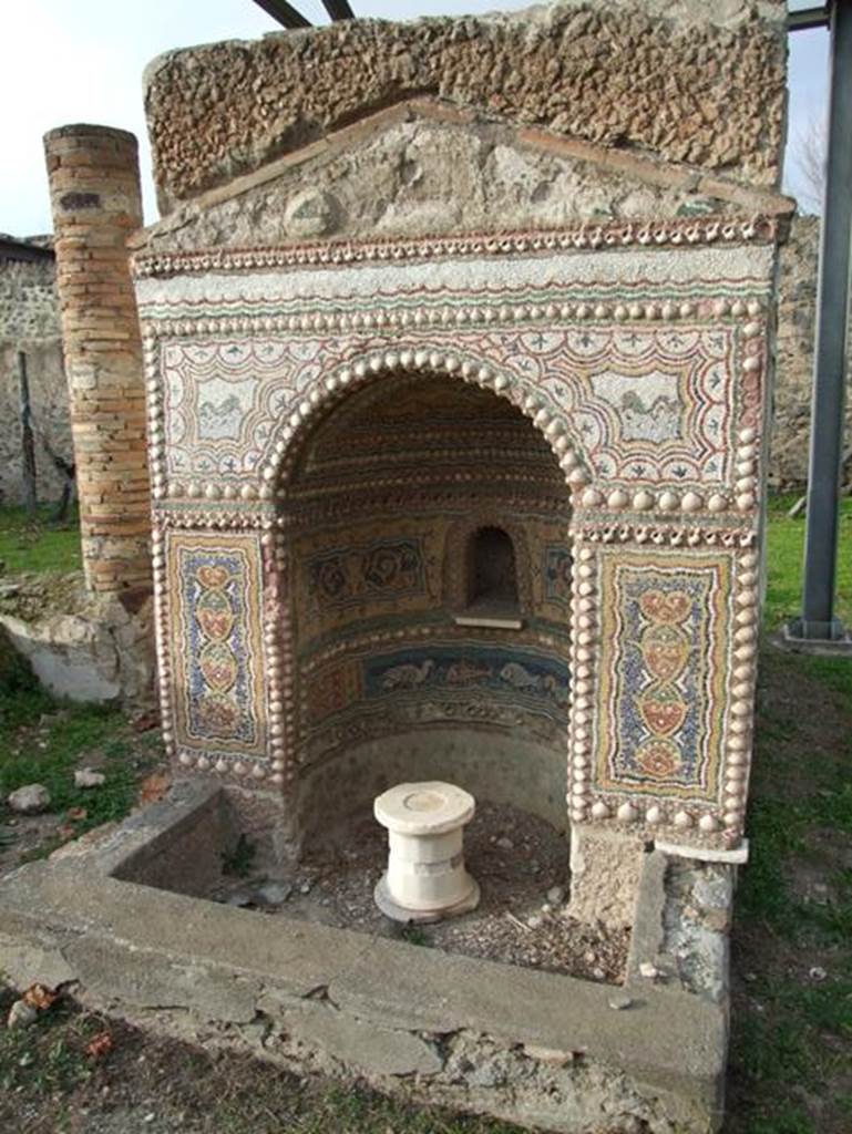 II.9.7. Garden entrance to House of Summer Triclinium.  December 2007.  Fountain or Nymphaeum on the north side.  South face.