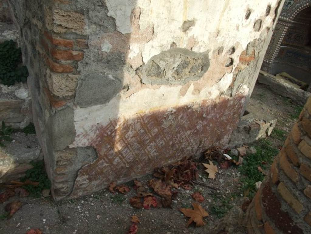 II.9.7. Garden entrance to House of Summer Triclinium.  December 2007.  West face of north fountain.  Painted trellis work pattern.