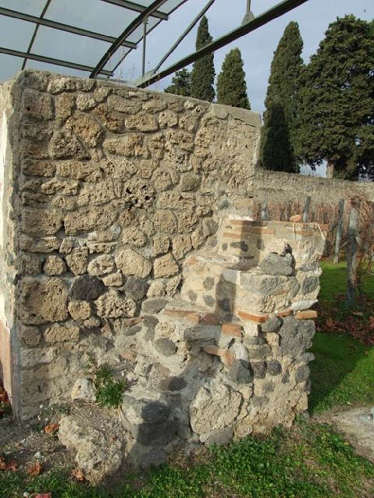 II.9.7. Garden entrance to House of Summer Triclinium.  December 2007.  Stone steps on south face of south fountain.