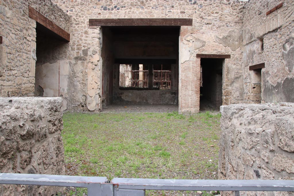 III.2.1 Pompeii. May 2024. 
Room 1, looking north across atrium towards tablinum, from entrance vestibule. Photo courtesy of Klaus Heese.
