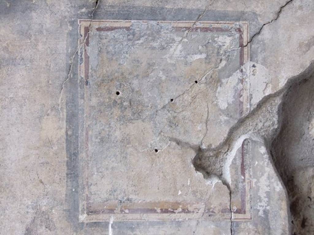 III.2.1 Pompeii. March 2009. 
Room 9, tablinum. Remains of wall painting in central panel on west wall, possibly Dionysus and panther.
See Bragantini, de Vos, Badoni, 1981. Pitture e Pavimenti di Pompei, Parte 1. Rome: ICCD. (p.246).
Kuivalainen�s description �
�A sitting youth, depicted frontally, in a landscape scene. He wears a yellow tunic with a green cloak over his left shoulder and an ivy wreath on his curly hair; his right forearm and hand are foreshortened. He looks away from the panther, for whom he offers wine from the cup in his right hand. The beast is standing on a sloping ground. In the background grows a large tree, from which a mask with horns hangs down.�
See Kuivalainen, I., 2021. The Portrayal of Pompeian Bacchus. Commentationes Humanarum Litterarum 140. Helsinki: Finnish Society of Sciences and Letters, (p.119, C19).
