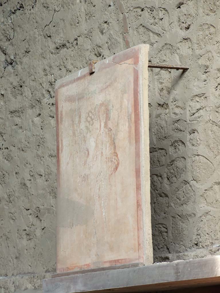 III.3.6 Pompeii. December 2007. Displayed on east wall - painting of Bacchus and Mercury. 
Pilaster painting from south side of entrance façade of II.1.12 Complesso dei Riti magici.
See Fröhlich, T., 1991, Lararien und Fassadenbilder in den Vesuvstädten. Mainz: von Zabern. (F16: p. 312, T. 54/1).
