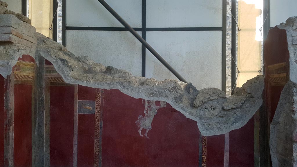 III.3.6 Pompeii. August 2023. Looking towards painted panel at north end of east wall. Photo courtesy of Maribel Velasco.