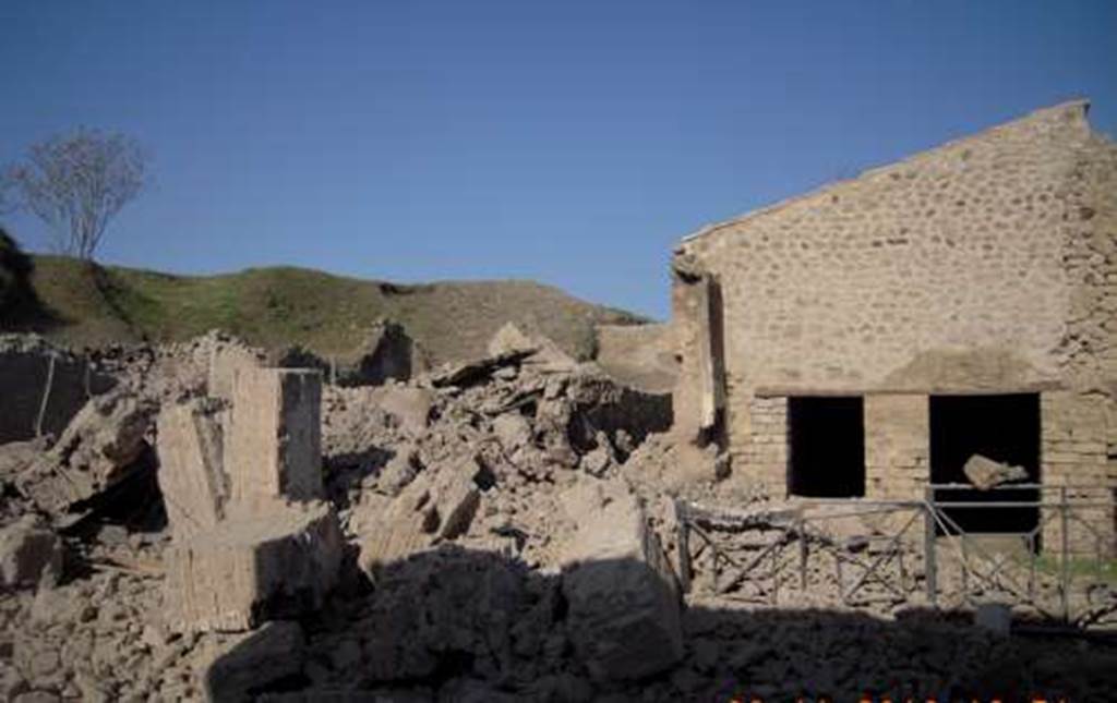 III.3.6 Pompeii, Vicolo di Ifigenia and III.4.1, with metal buckled �PompeiViva� new gates. November 2010.