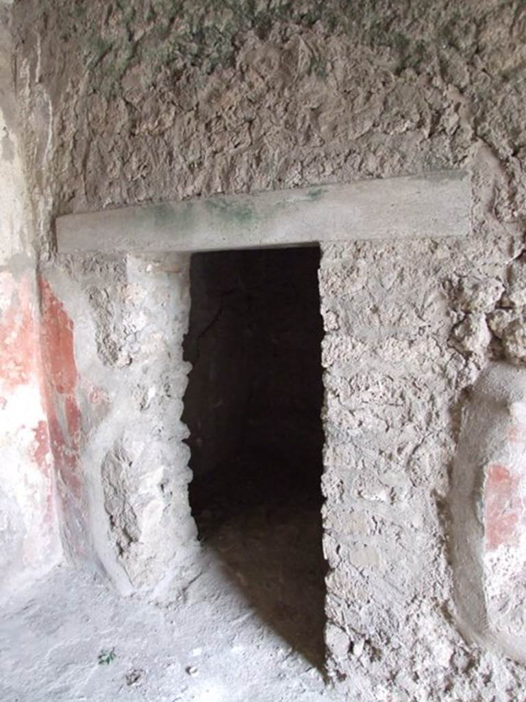III.4.3  Pompeii.  March 2009.  Doorway to Room 2, on east side of entrance corridor.