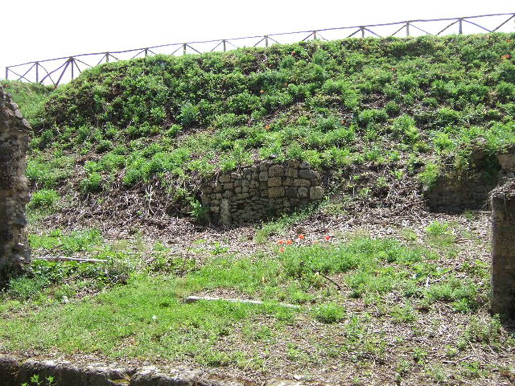 III.11.4 Pompeii. May 2006.  Entrance, site of east wall, south wall and doorway to rear room. 