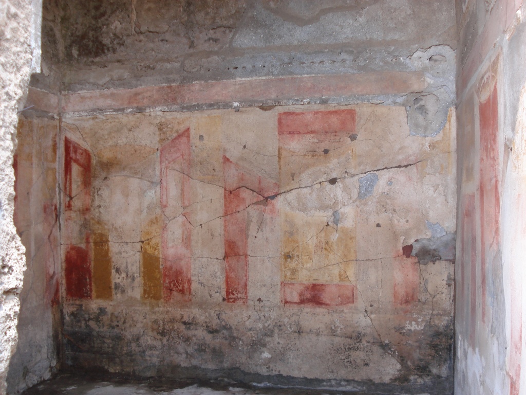 V.1.7 Pompeii. c.2005-7. Room 7, looking east through doorway. Photo by Thomas Staub.
Photo courtesy of the Swedish Pompeii Project.