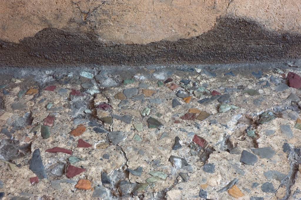 V.1.7 Pompeii. c.2005-7. Room 7, detail of flooring at base of south wall. Photo by Thomas Staub.
Photo courtesy of the Swedish Pompeii Project.